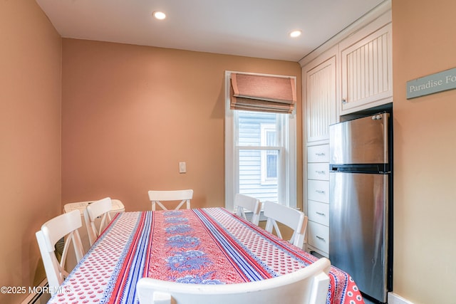 dining space with recessed lighting
