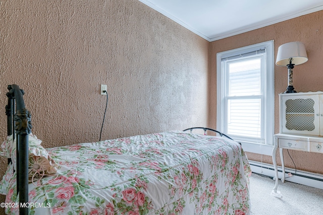 bedroom with a baseboard heating unit, crown molding, a textured wall, and carpet