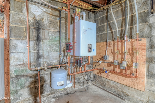 utility room featuring water heater