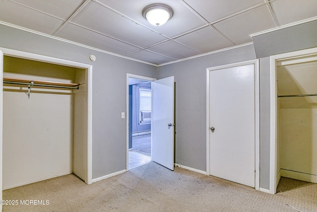 unfurnished bedroom with carpet floors and a closet