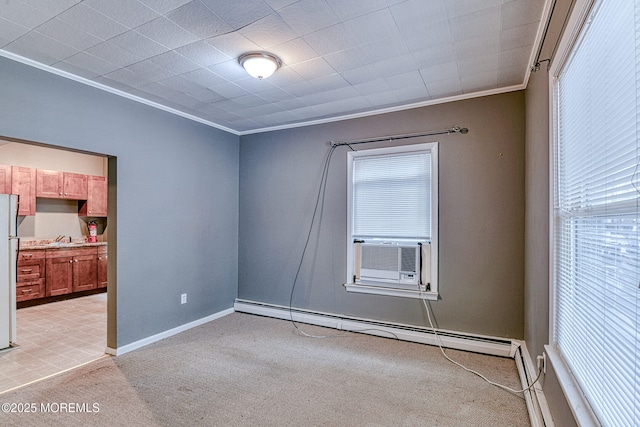 unfurnished room with ornamental molding, light colored carpet, a baseboard radiator, healthy amount of natural light, and cooling unit