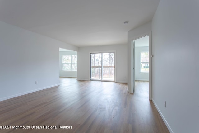 79 Diane Dr, Tinton Falls, NJ 07753 - empty room with wood finished floors and baseboards