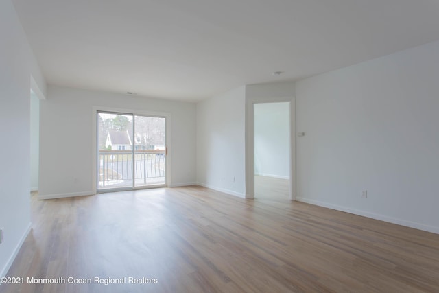 79 Diane Dr, Tinton Falls, NJ 07753 - empty room featuring wood finished floors and baseboards