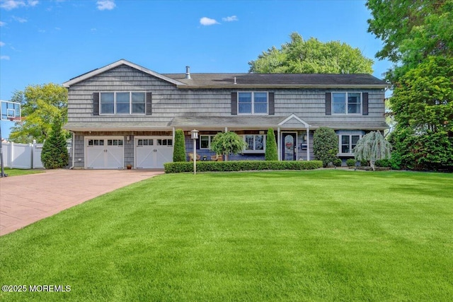 55 Yorktowne Dr, Manalapan, NJ 07726 - view of front of home featuring an attached garage and driveway