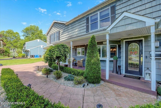 55 Yorktowne Dr, Manalapan, NJ 07726 - property entrance with covered porch