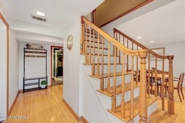 55 Yorktowne Dr, Manalapan, NJ 07726 - staircase featuring baseboards, hardwood / wood-style flooring, and recessed lighting