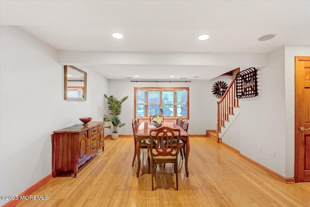 55 Yorktowne Dr, Manalapan, NJ 07726 - dining space featuring baseboards, stairway, light wood-type flooring, and recessed lighting
