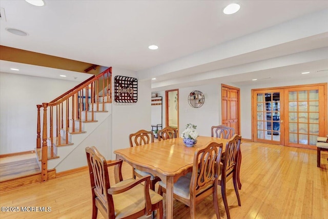 55 Yorktowne Dr, Manalapan, NJ 07726 - dining space with light wood finished floors, recessed lighting, french doors, stairs, and baseboards
