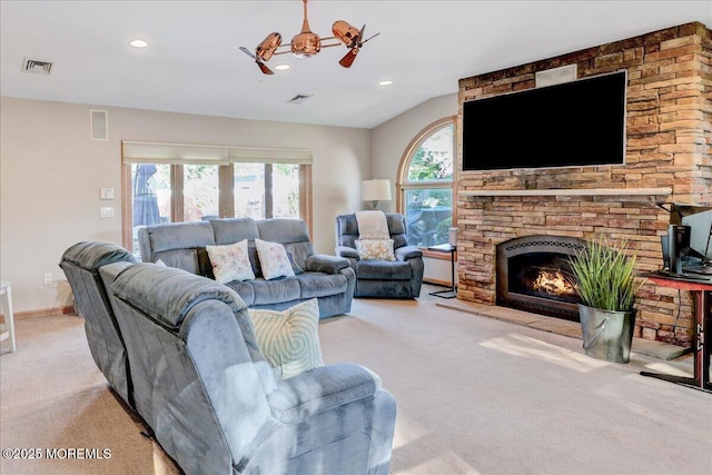 55 Yorktowne Dr, Manalapan, NJ 07726 - carpeted living area featuring a fireplace, a ceiling fan, recessed lighting, and baseboards