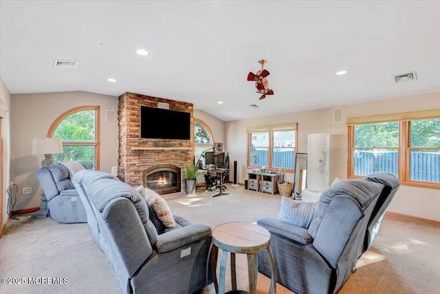 55 Yorktowne Dr, Manalapan, NJ 07726 - living area featuring light carpet, a fireplace, vaulted ceiling, recessed lighting, and baseboards