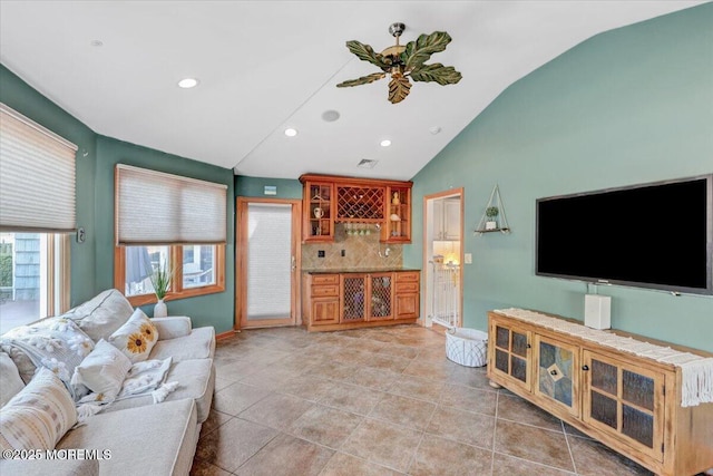 55 Yorktowne Dr, Manalapan, NJ 07726 - living room with vaulted ceiling, baseboards, recessed lighting, and light tile patterned flooring