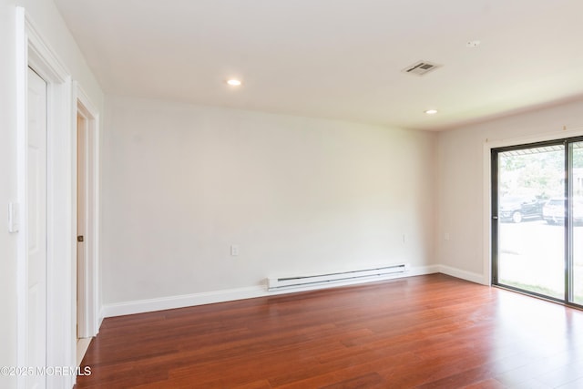 7 Danbury Ct, Red Bank, NJ 07701 - unfurnished room featuring a baseboard radiator, wood finished floors, and recessed lighting