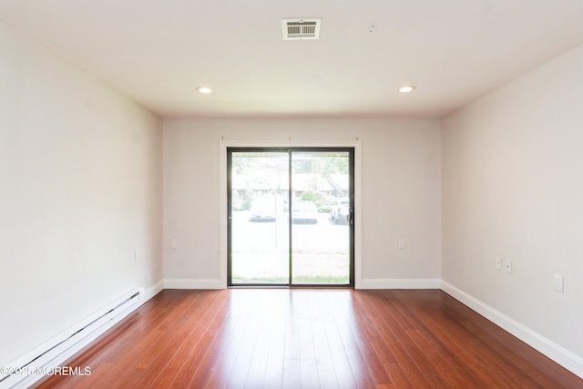 7 Danbury Ct, Red Bank, NJ 07701 - unfurnished room featuring baseboard heating, wood finished floors, and recessed lighting