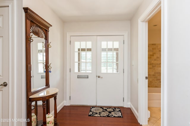 7 Danbury Ct, Red Bank, NJ 07701 - doorway to outside featuring wood finished floors and baseboards