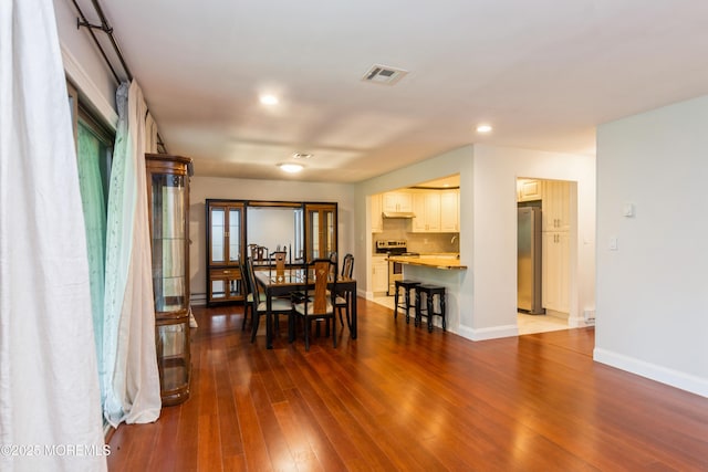 7 Danbury Ct, Red Bank, NJ 07701 - dining area with dark wood finished floors and recessed lighting