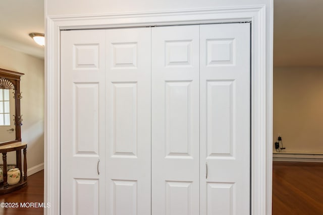 7 Danbury Ct, Red Bank, NJ 07701 - detailed view of wood finished floors and a baseboard radiator