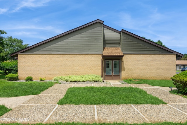 7 Danbury Ct, Red Bank, NJ 07701 - view of side of home featuring brick siding and a lawn