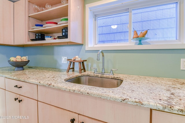 70 Clark Ave, Ocean Grove, NJ 07756 - kitchen featuring a sink, light stone counters, open shelves, and light brown cabinetry