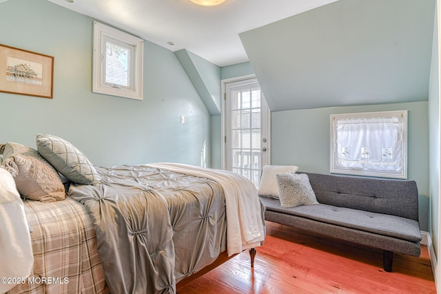 70 Clark Ave, Ocean Grove, NJ 07756 - bedroom featuring wood finished floors, vaulted ceiling, and access to exterior