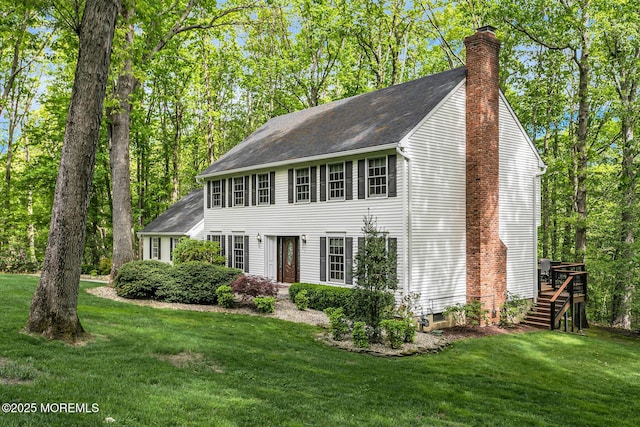 112 Deer Path Ln, Freehold, NJ 07728 - colonial inspired home featuring a chimney, a front lawn, stairs, and a shingled roof