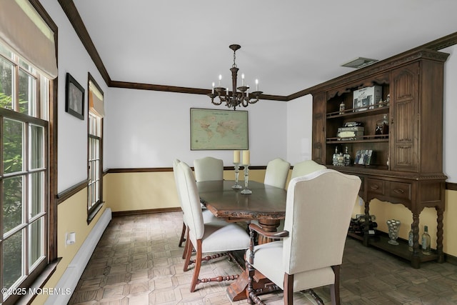 112 Deer Path Ln, Freehold, NJ 07728 - dining space with a chandelier, baseboards, and ornamental molding