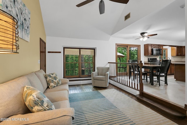 112 Deer Path Ln, Freehold, NJ 07728 - living room with a ceiling fan, a baseboard radiator, light wood finished floors, and high vaulted ceiling