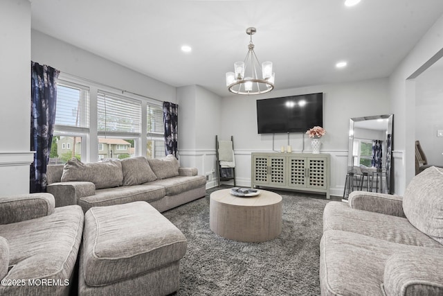639 Longview Dr, Toms River, NJ 08753 - living room featuring healthy amount of natural light, a chandelier, a wainscoted wall, a decorative wall, and recessed lighting