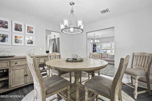 639 Longview Dr, Toms River, NJ 08753 - dining space featuring a chandelier and dark wood-style floors