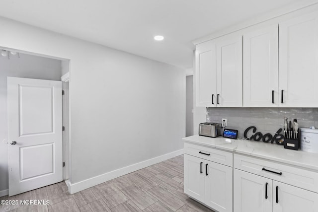 639 Longview Dr, Toms River, NJ 08753 - kitchen featuring baseboards, backsplash, white cabinets, light wood finished floors, and recessed lighting