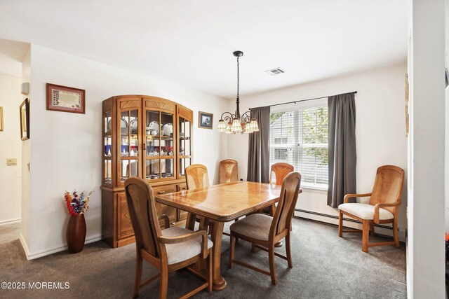 14 Winterton Dr, Toms River, NJ 08757 - carpeted dining room with a chandelier and baseboards