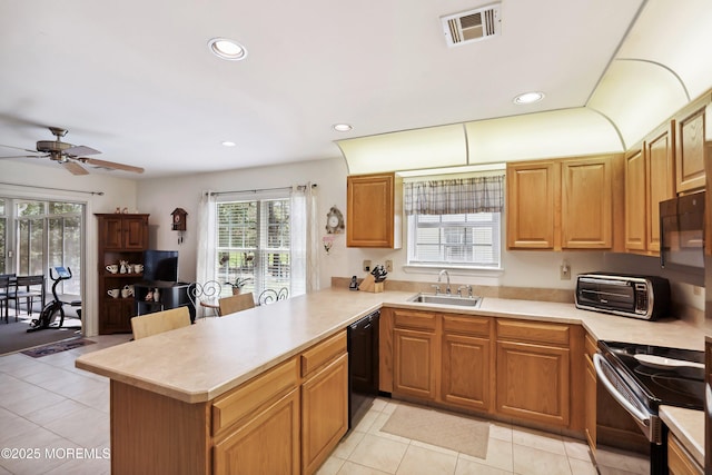 14 Winterton Dr, Toms River, NJ 08757 - kitchen featuring electric stove, black dishwasher, a sink, light countertops, and recessed lighting