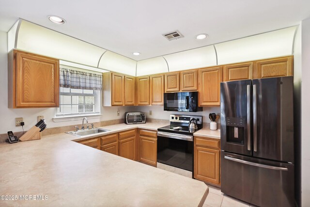 14 Winterton Dr, Toms River, NJ 08757 - kitchen featuring refrigerator with ice dispenser, black microwave, a sink, electric stove, and light countertops