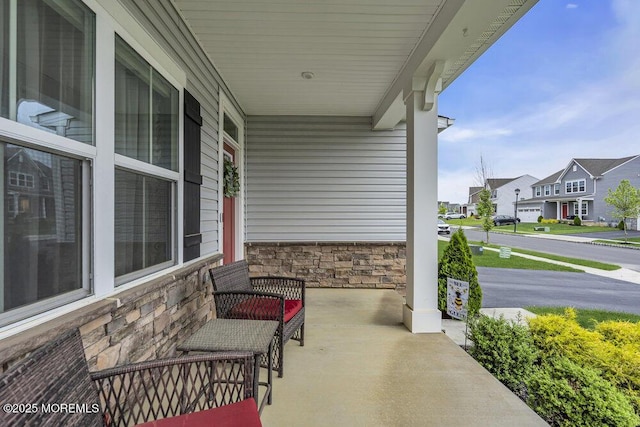 83 Weston Dr, Woolwich, NJ 08085 - view of patio / terrace with a porch and a residential view