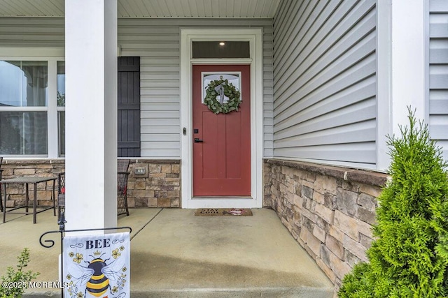 83 Weston Dr, Woolwich, NJ 08085 - entrance to property featuring stone siding and a porch