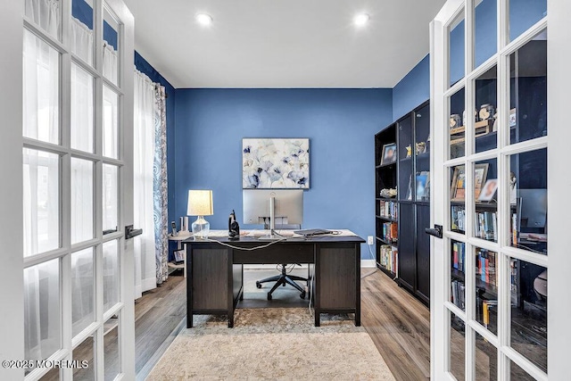 83 Weston Dr, Woolwich, NJ 08085 - office with french doors, wood finished floors, and baseboards