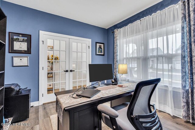 83 Weston Dr, Woolwich, NJ 08085 - office space featuring french doors, wood finished floors, and baseboards