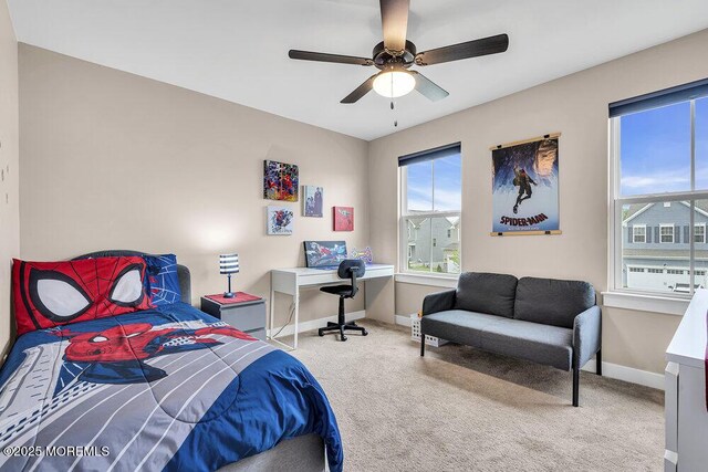 83 Weston Dr, Woolwich, NJ 08085 - bedroom with carpet floors, baseboards, a ceiling fan, and an office area