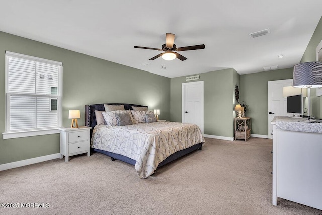 83 Weston Dr, Woolwich, NJ 08085 - bedroom with light carpet, baseboards, and ceiling fan