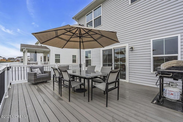83 Weston Dr, Woolwich, NJ 08085 - wooden deck featuring outdoor dining space