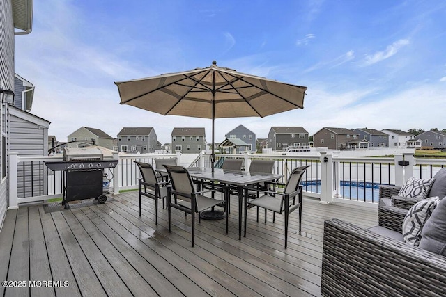 83 Weston Dr, Woolwich, NJ 08085 - deck featuring a residential view, outdoor dining area, and grilling area