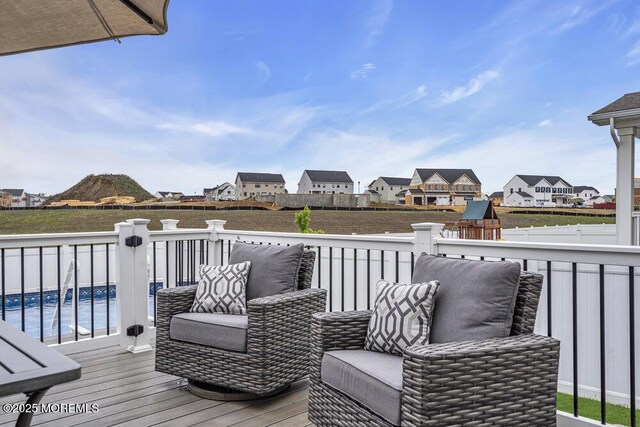 83 Weston Dr, Woolwich, NJ 08085 - wooden deck featuring a residential view