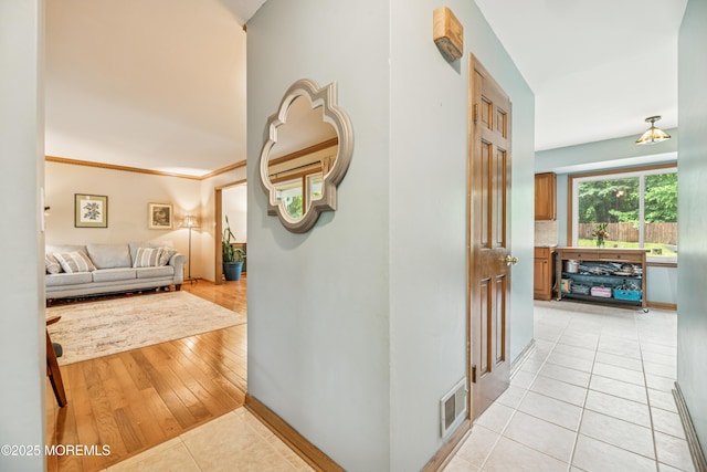 325 Oak Hill Rd, Red Bank, NJ 07701 - hall with light tile patterned floors and baseboards