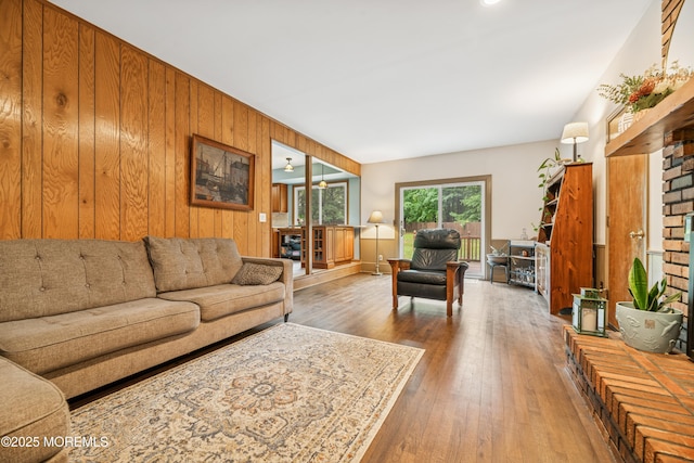 325 Oak Hill Rd, Red Bank, NJ 07701 - living room featuring hardwood / wood-style floors and wooden walls