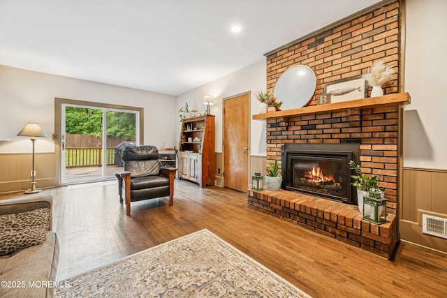 325 Oak Hill Rd, Red Bank, NJ 07701 - living room with wood finished floors, a fireplace, wainscoting, and recessed lighting