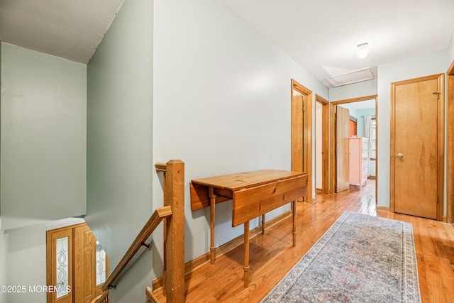 325 Oak Hill Rd, Red Bank, NJ 07701 - corridor with an upstairs landing, light wood-style floors, and attic access