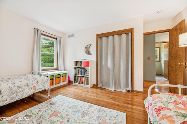 325 Oak Hill Rd, Red Bank, NJ 07701 - bedroom with wood finished floors and baseboards