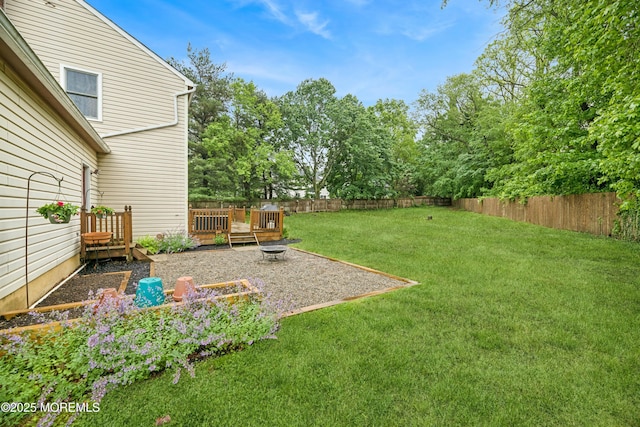 325 Oak Hill Rd, Red Bank, NJ 07701 - view of yard featuring an outdoor fire pit and a wooden deck