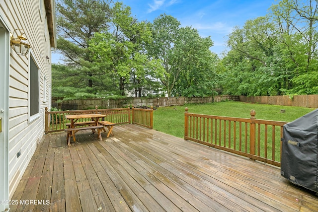 325 Oak Hill Rd, Red Bank, NJ 07701 - wooden deck featuring a grill, outdoor dining area, and view of scattered trees