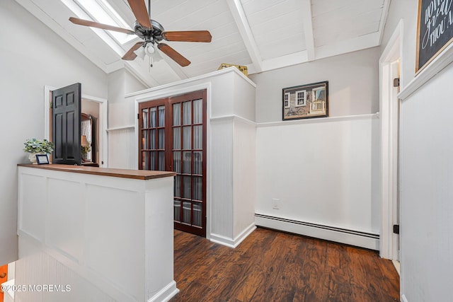 hallway with a baseboard radiator, wood finished floors, and wood ceiling