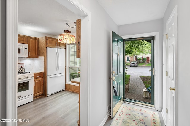 21 Steeple Chase Ct, Tinton Falls, NJ 07724 - foyer entrance featuring light wood-style floors